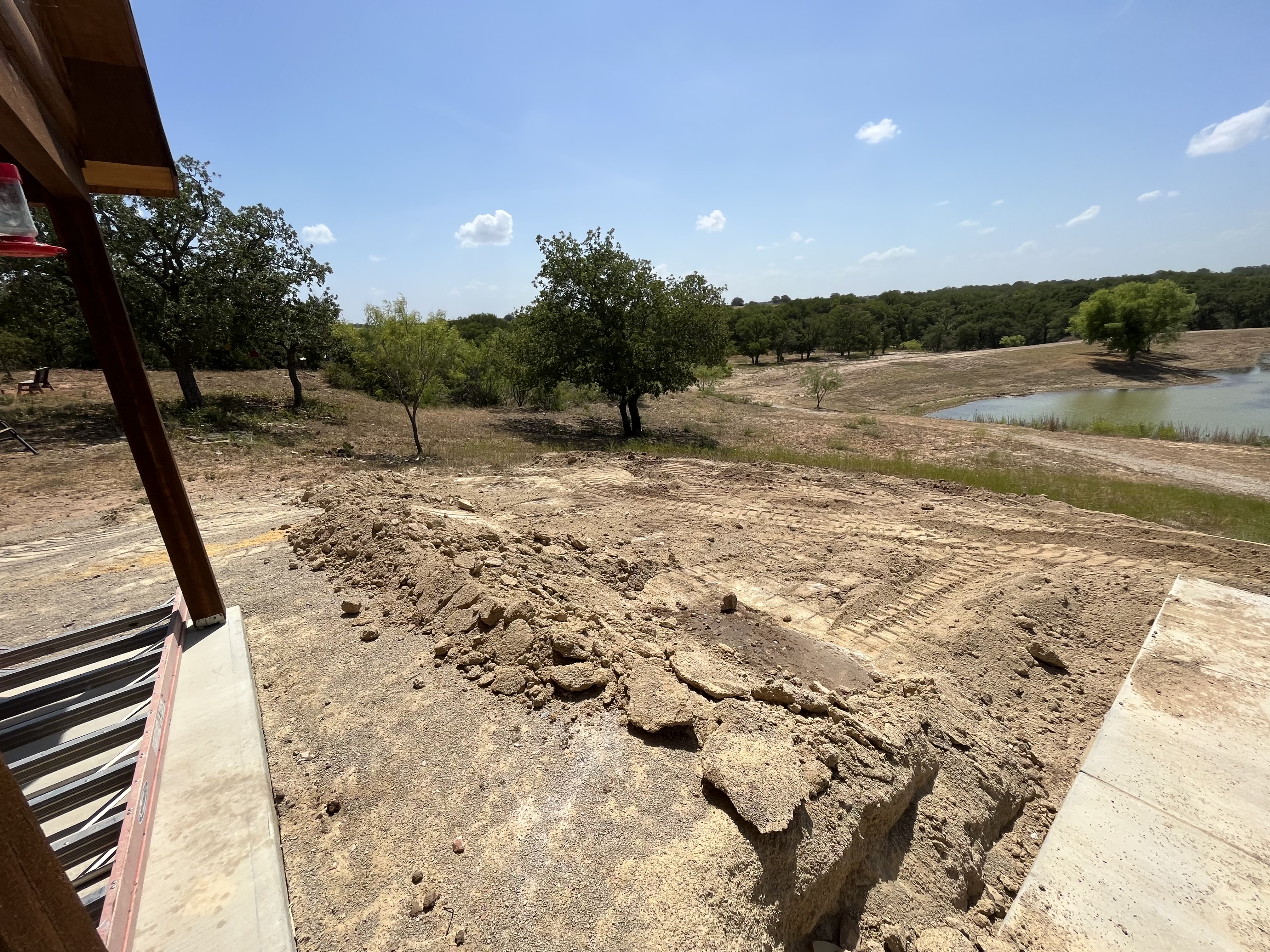 Before: raw land prior to excavation work by TX Dirt Co